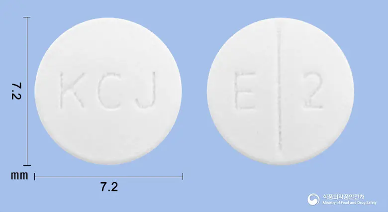 베포타린정10mg(베포타스틴베실산염) 앞뒤 사진 (흰색 원형, 각인 KCJ / E 2)