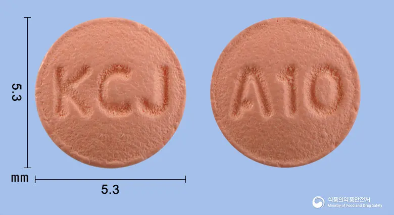 제이씨쿠에티아핀정25mg(쿠에티아핀푸마르산염) 앞뒤 사진 (분홍색 원형, 각인 KCJ / A10)