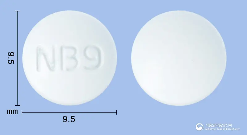 메부란정(트리메부틴말레산염) 앞뒤 사진 (흰색 원형, 각인 NB9)