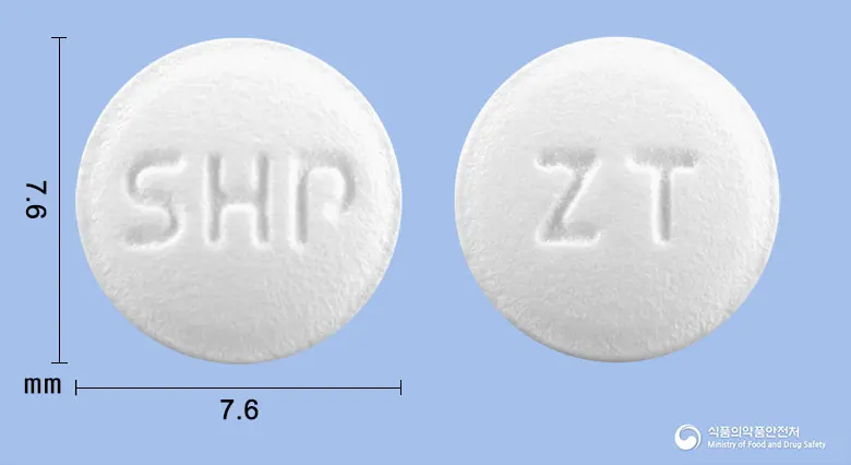 잘토젠정(잘토프로펜) 앞뒤 사진 (흰색 원형, 각인 SHP / ZT)