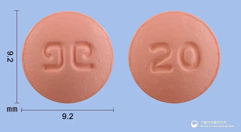 로수바신정20mg(로수바스타틴칼슘) 앞뒤 사진 (분홍색 원형, 각인 20)