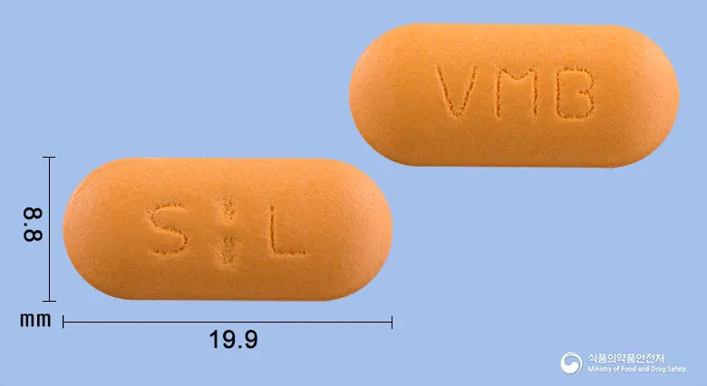 비타마스정 앞뒤 사진 (주황색 장방형, 각인 VMB)