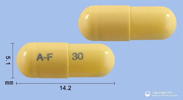 에이플루캡슐30밀리그램(오셀타미비르인산염) 앞뒤 사진 (노란색 캡슐, 각인 A-F 30)
