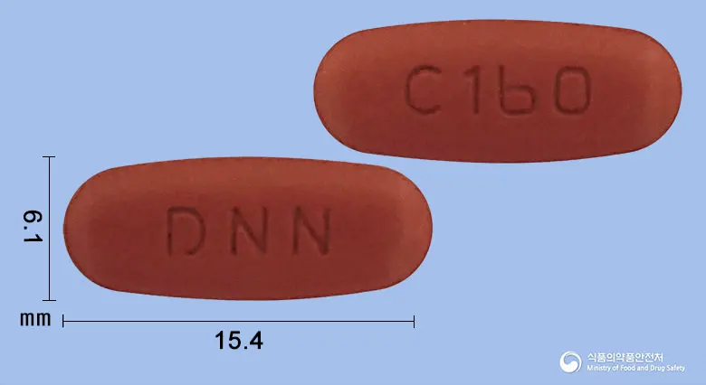 코발사텍정160/12.5밀리그램 앞뒤 사진 (빨간색 타원형, 각인 DNN / C160)