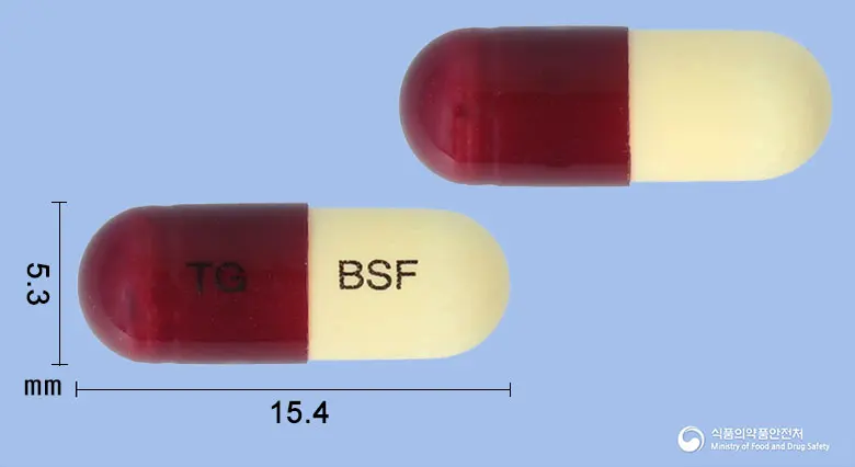 바스크롱에프캡슐 앞뒤 사진 (자주색 캡슐, 각인 TG BSF)