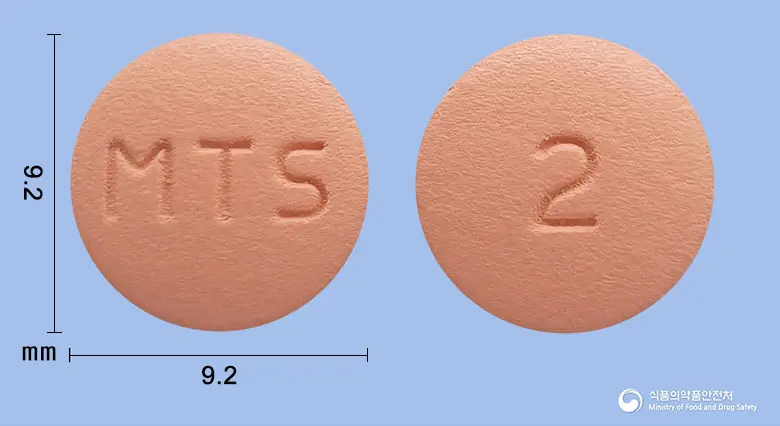 로수틴엠정20mg(로수바스타틴칼슘) 앞뒤 사진 (분홍색 원형, 각인 MTS / 2)