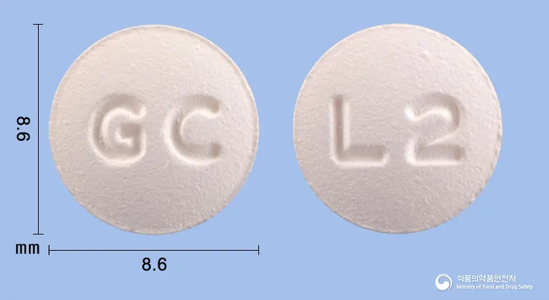 락사졸로정2밀리그램(프루칼로프라이드숙신산염) 앞뒤 사진 (분홍색 원형, 각인 GC / L2)