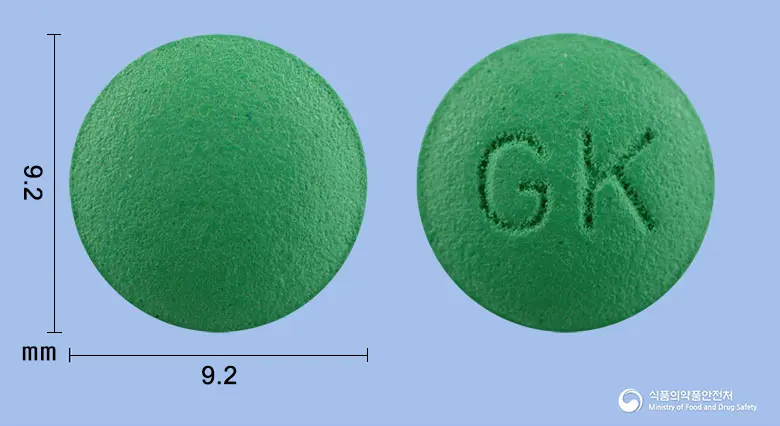 진코란정120mg(은행엽건조엑스) 앞뒤 사진 (초록색 원형, 각인 GK)