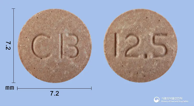 카베씨티정12.5mg(카르베딜롤) 앞뒤 사진 (분홍색 원형, 각인 CB / I2.5)