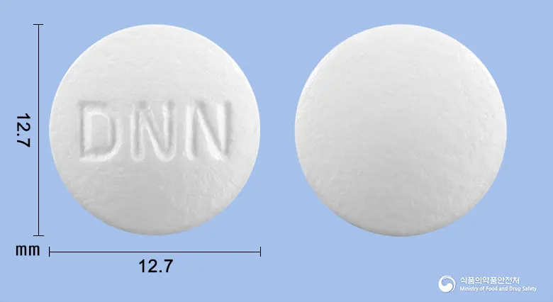 엠폴민정500mg(메트포르민염산염) 앞뒤 사진 (흰색 원형, 각인 DNN)