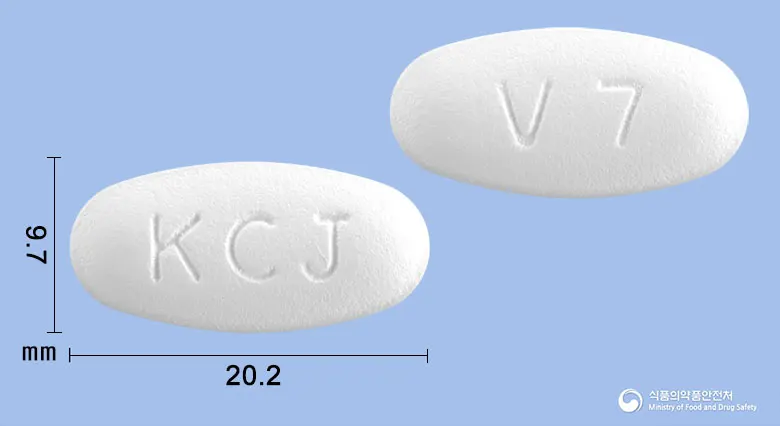 플레밍정625mg(아목시실린·클라불란산칼륨) 앞뒤 사진 (흰색 타원형, 각인 KCJ / V7)
