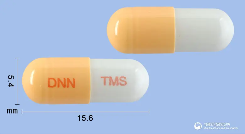다나탐스서방캡슐0.2mg(탐스로신염산염) 앞뒤 사진 (주황색 캡슐, 각인 DNN TMS)