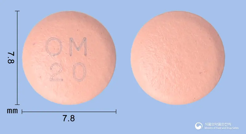 에스오피라졸정20mg(에스오메프라졸마그네슘삼수화물) 앞뒤 사진 (분홍색 원형, 각인 OM20)
