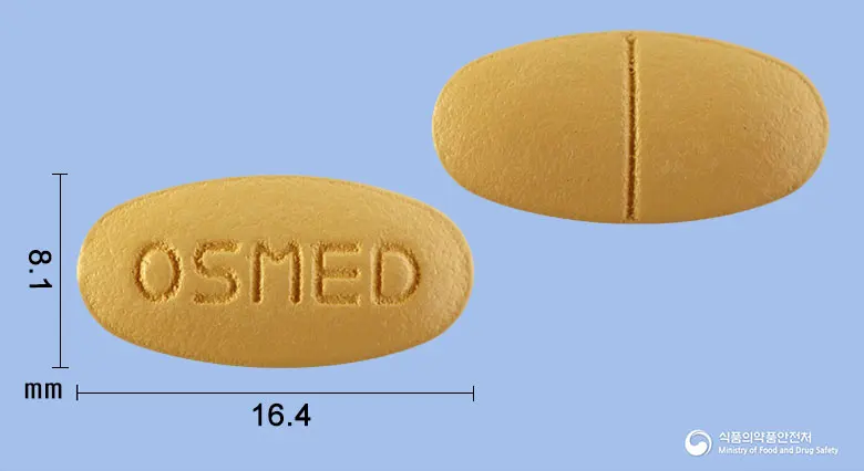 오스메드정 앞뒤 사진 (갈색 타원형, 각인 OSMED)