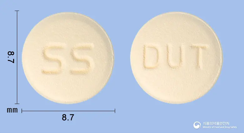 삼성두타스테리드정0.5밀리그램 앞뒤 사진 (노란색 원형, 각인 SS / DUT)