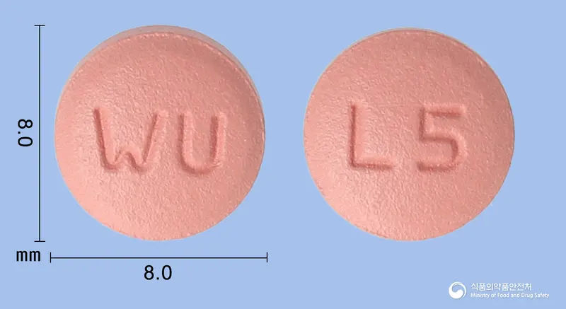 리트라젠정5mg(리나글립틴) 앞뒤 사진 (분홍색 원형, 각인 WU / L5)