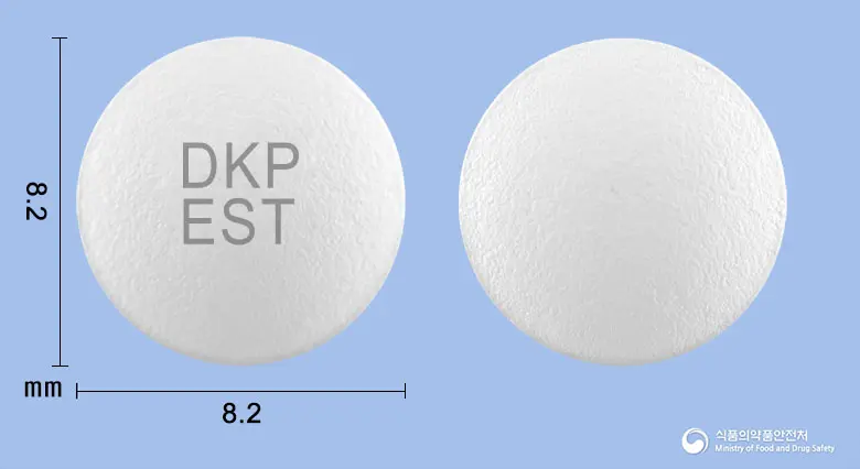 동구에페리손서방정(에페리손염산염) 앞뒤 사진 (흰색 원형, 각인 DKPEST)