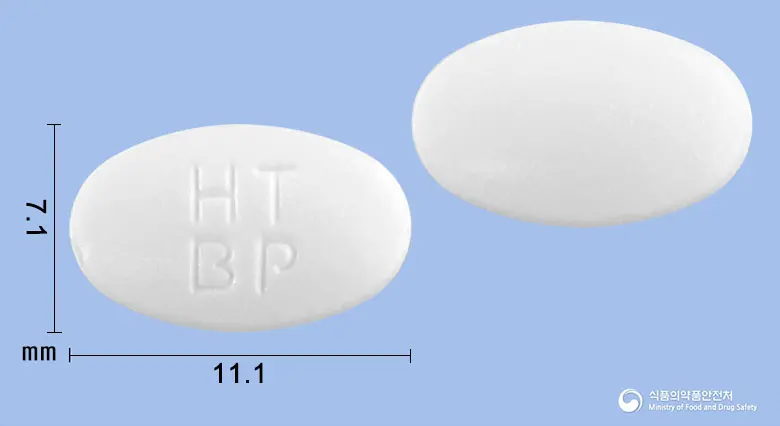비페란정(비페닐디메틸디카르복실레이트) 앞뒤 사진 (흰색 타원형, 각인 HTBP)