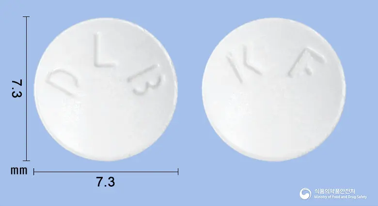 케토마린정(케토티펜푸마르산염) 앞뒤 사진 (흰색 원형, 각인 DLB / KF)