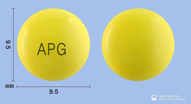 슬램비타정 앞뒤 사진 (노란색 원형, 각인 APG)
