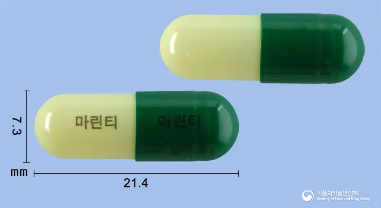 마린티캡슐 앞뒤 사진 (초록색 캡슐, 각인 마린티 마린티)