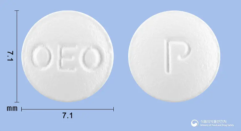 삼남파모티딘정20밀리그램 앞뒤 사진 (흰색 원형, 각인 OEO / P)