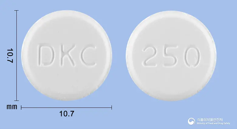 도베마린정250밀리그램(도베실산칼슘수화물) 앞뒤 사진 (흰색 원형, 각인 DKC / 250)