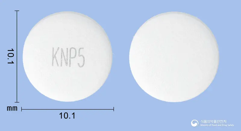 팜시트정250mg(팜시클로비르) 앞뒤 사진 (흰색 원형, 각인 KNP5)