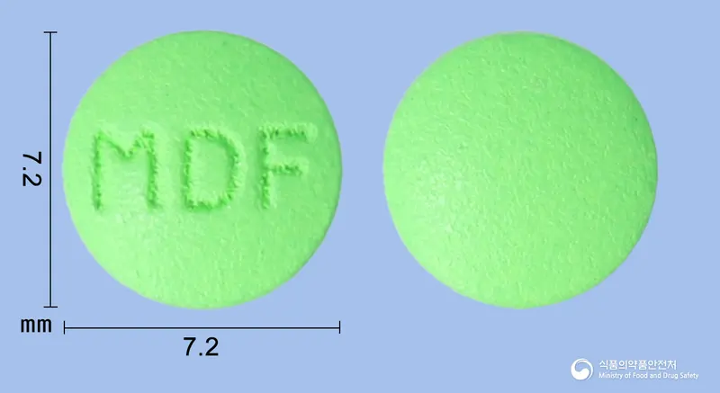 파모트리정20밀리그램(파모티딘) 앞뒤 사진 (연두색 원형, 각인 MDF)