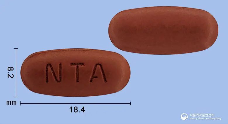 뉴트리액티브정 앞뒤 사진 (갈색 타원형, 각인 NTA)