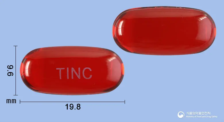 티엔콜연질캡슐 앞뒤 사진 (빨간색·투명 캡슐, 각인 TINC)
