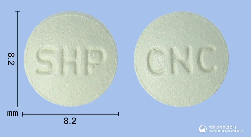 레그칼정25밀리그램(시나칼세트염산염) 앞뒤 사진 (연두색 원형, 각인 SHP / CNC)