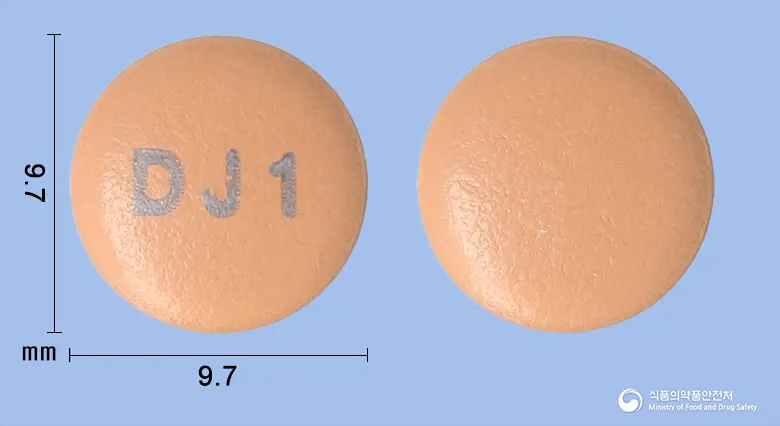 당이자누정100밀리그램(시타글립틴염산염수화물) 앞뒤 사진 (분홍색 원형, 각인 DJ1)