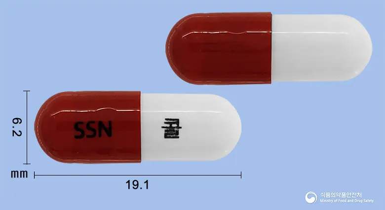 플루콜캡슐 앞뒤 사진 (빨간색 캡슐, 각인 SSN 콜)