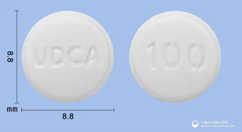 우소산정100밀리그램(우르소데옥시콜산) 앞뒤 사진 (흰색 원형, 각인 100 / UDCA)