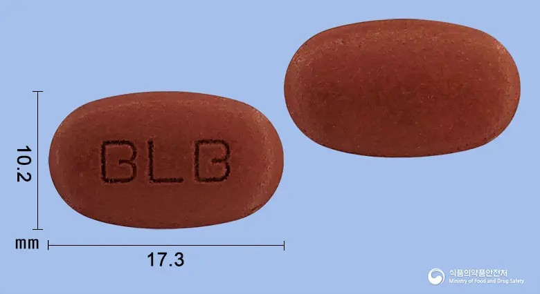 비엘비정 앞뒤 사진 (갈색 타원형, 각인 BLB)