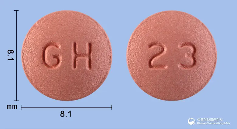 도네일정23밀리그램(도네페질염산염수화물) 앞뒤 사진 (분홍색 원형, 각인 GH / 23)