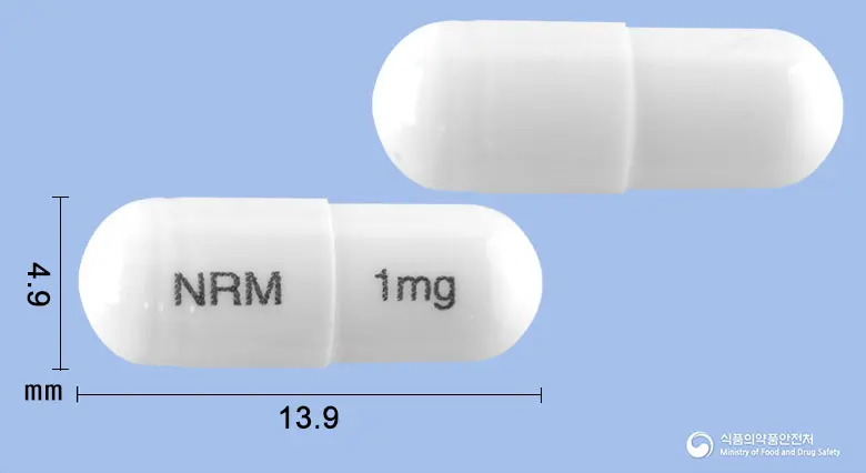 뉴로미스캡슐1밀리그램(타크로리무스수화물) 앞뒤 사진 (흰색 캡슐, 각인 NRM 1mg)