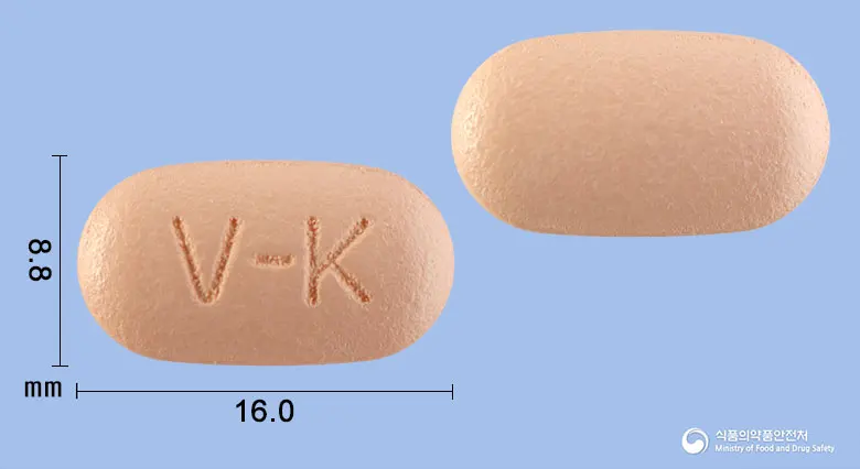 벤포칸정 앞뒤 사진 (분홍색 타원형, 각인 V-K)