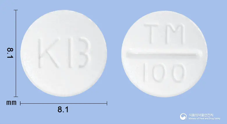 트리엘정100밀리그램(트리메부틴말레산염) 앞뒤 사진 (흰색 원형, 각인 KB / TM 100)