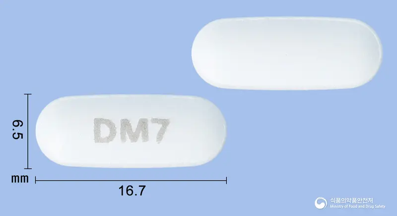 브이토젯정10/40밀리그램 앞뒤 사진 (흰색 타원형, 각인 DM7)