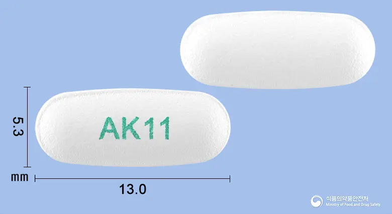 아토켓정10/10밀리그램 앞뒤 사진 (흰색 타원형, 각인 AK11)