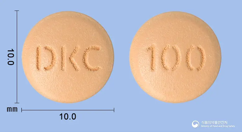 글리시타정100밀리그램(시타글립틴염산염수화물) 앞뒤 사진 (분홍색 원형, 각인 DKC / 100)