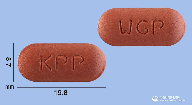 원광퍼펙타민정 앞뒤 사진 (갈색 장방형, 각인 KPP / WGP)