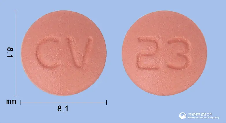 도페질정23밀리그램(도네페질염산염수화물) 앞뒤 사진 (분홍색 원형, 각인 CV / 23)