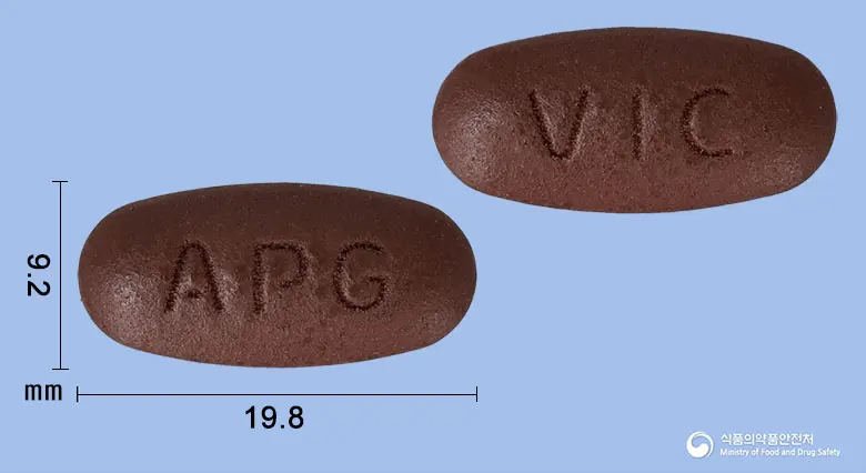 빅스코민에프정 앞뒤 사진 (갈색 타원형, 각인 APG / VIC)