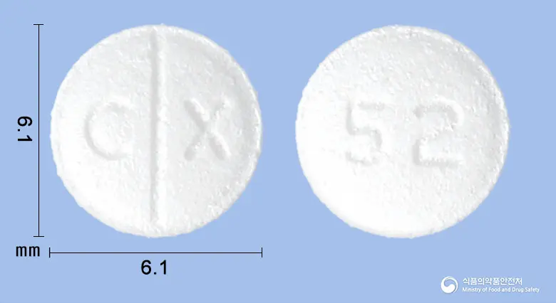에스토프정25mg(토피라메이트) 앞뒤 사진 (흰색 원형, 각인 C X / 52)