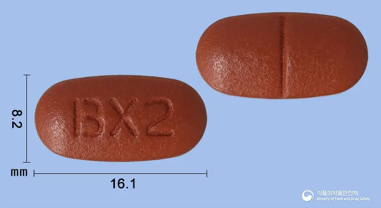더블비정 앞뒤 사진 (갈색 타원형, 각인 BX2)