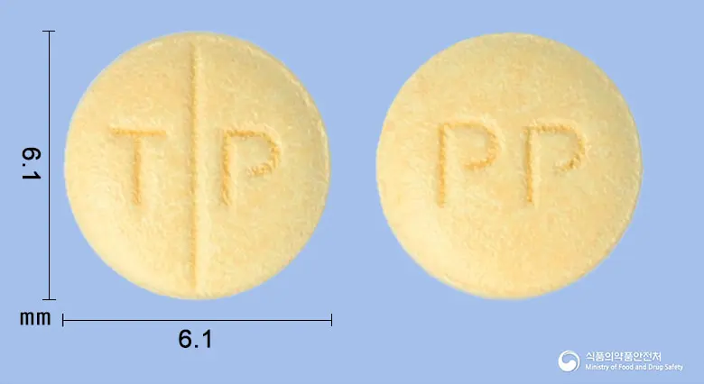 토피린정25밀리그램(토피라메이트) 앞뒤 사진 (노란색 원형, 각인 T P / PP)