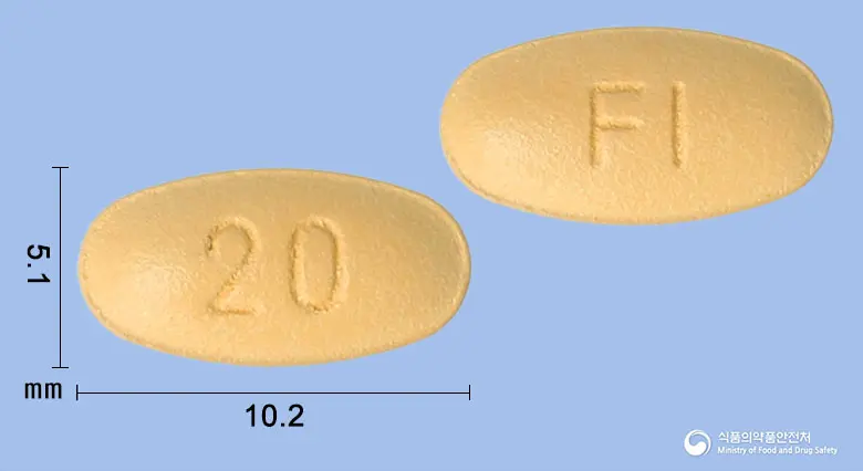 케렌디아정20밀리그램(피네레논) 앞뒤 사진 (주황색 타원형, 각인 20 / FI)